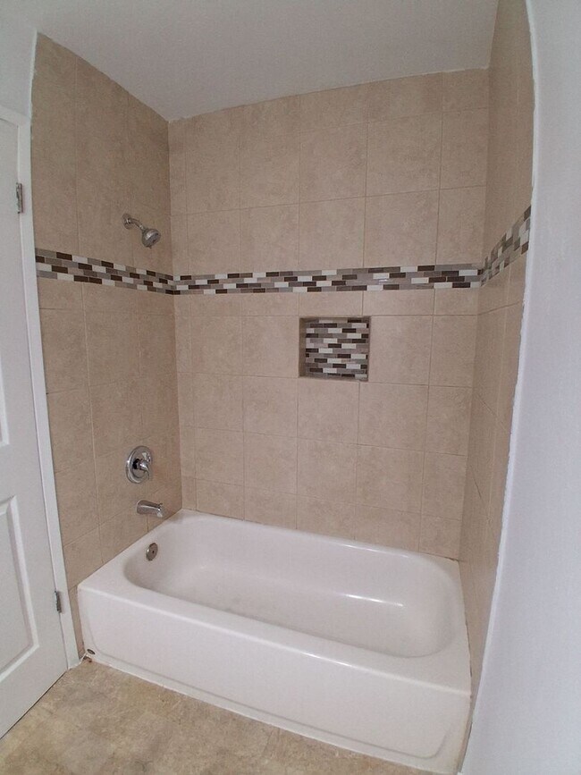 Building Photo - MOVE-IN SPECIAL: HALF OFF THE 1ST MONTH'S RENT – Beautifully Updated 2 Bedroom, 1 Bathroom Condo!