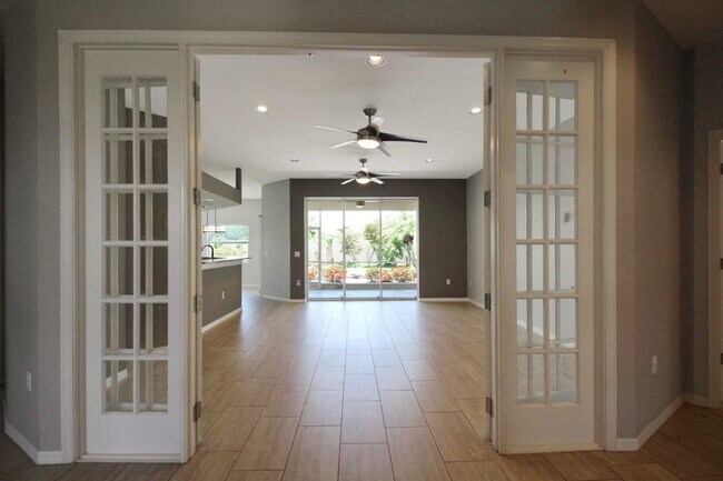 Building Photo - Annual rental: Spacious 3BR/2BA Creekwood Home with Office, Screened Lanai, EV Charger & Resort-S...