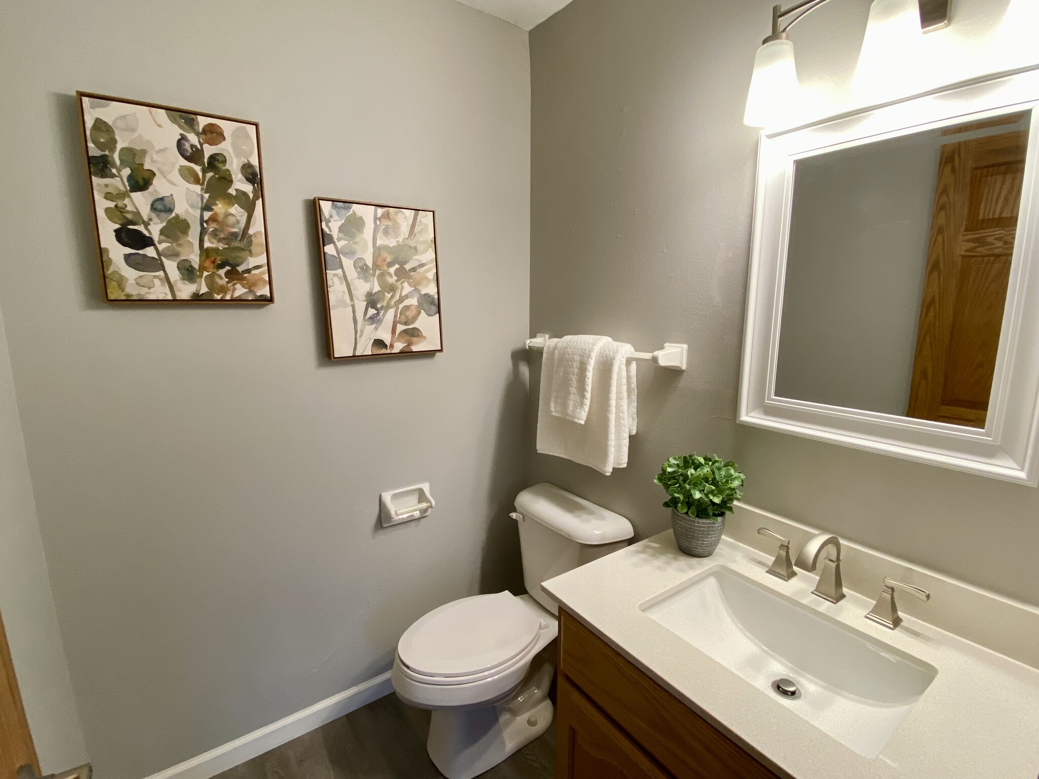 1/2 Bath with New Vanity, Flooring - N89W15976 Main St