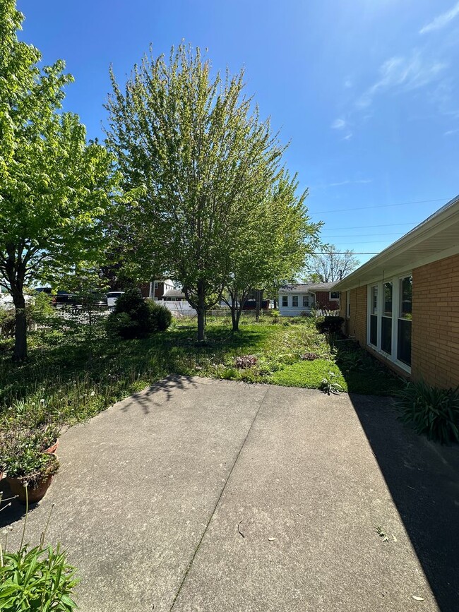 Building Photo - Not Your Typical Rental — Warm, Welcoming 3BR Brick Ranch in a Prime Neighborhood