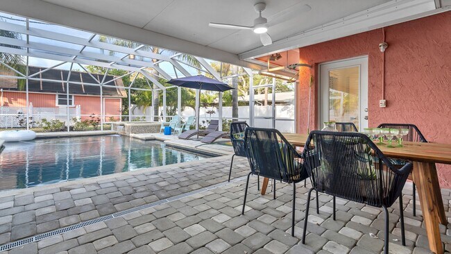 Building Photo - Luxurious FURNISHED 4BR/3BA Pool Home with...