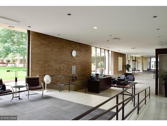 Nearly 2 blocks long modern lobby with seating areas throughout. - 15 S 1st St