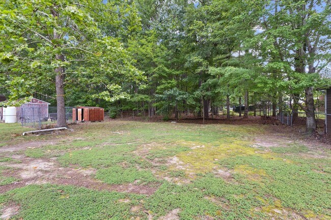 Building Photo - Updated Four bedroom, two full bathroom home