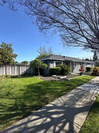 Building Photo - Don't miss this clean and cozy duplex with...