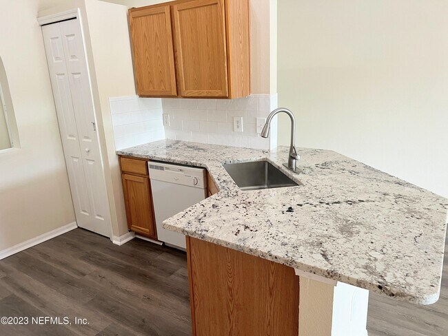 Building Photo - 6580 Gentle Oaks Dr N