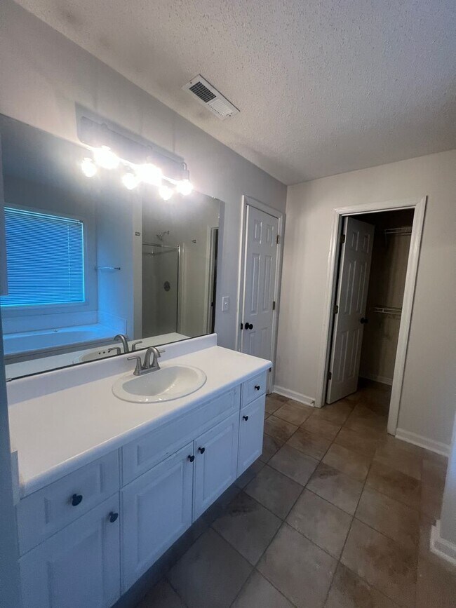 Building Photo - RENT SPECIAL! Freshly Painted! New Luxury ...