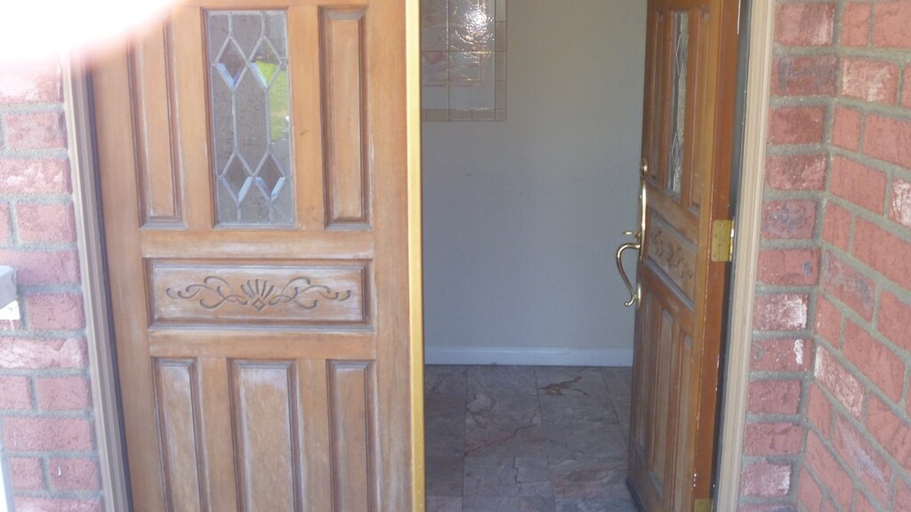 FRONT DOOR & MARBLE FLOOR ENTRY - 2106 Clark Ln