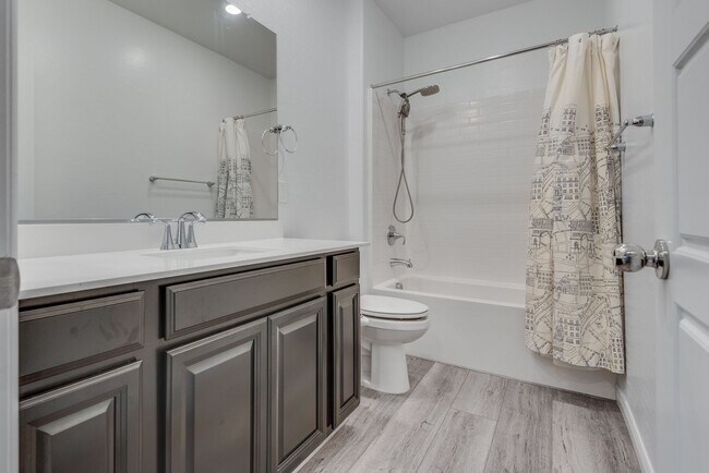 Building Photo - Like new, split-level, 3 bed, 2.5 bath, with bonus room & Strip views in West Las Vegas!