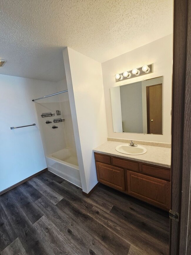 Building Photo - Fully Remodeled 1,250 Sq Ft 2 Bedroom Apartment with Garage, In-Unit Laundry & Private Balcony – ...