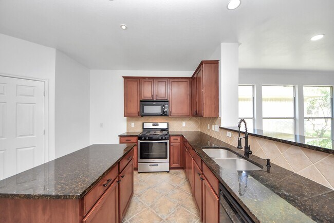 Building Photo - 7330 Jacobs Well Dr