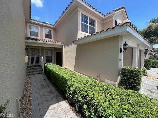 Building Photo - 10339 Whispering Palms Dr