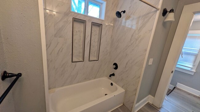 Building Photo - Come home to this great single family home with tons of charm and a beautiful yard