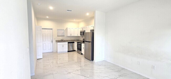 Building Photo - Brand-New Modern 2BR/1BA Home – Desirable Lehigh Location