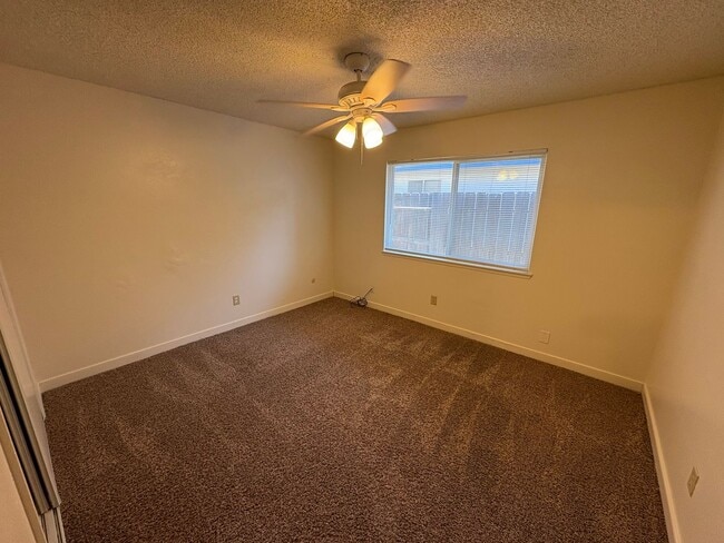 Building Photo - Move in ready apartment available now!