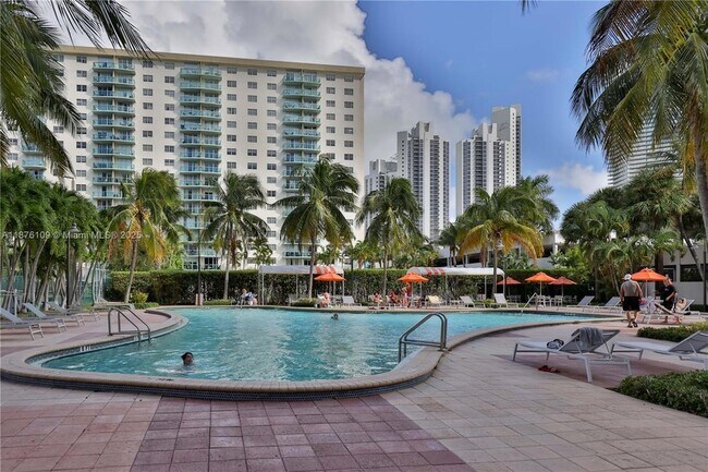 Building Photo - 19380 Collins Ave