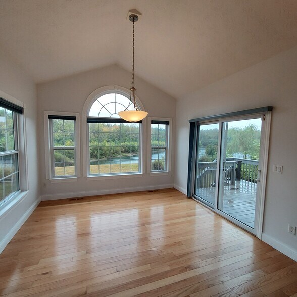 Morning room opens to deck, overlooks pond - 1238 Freedom Pt