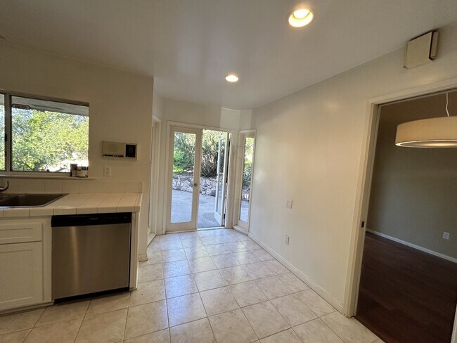 Breakfast area with door leading to outside - 17218 Escalon Dr