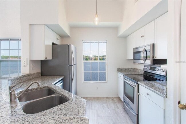 Building Photo - 9704 Lake Chase Island Way