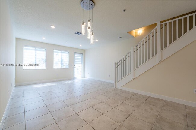 Building Photo - 6425 NW 103rd Pl