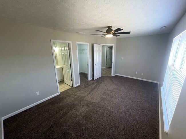 Building Photo - SUBLEASE - Three Bedroom Single Family Home with Fenced Backyard