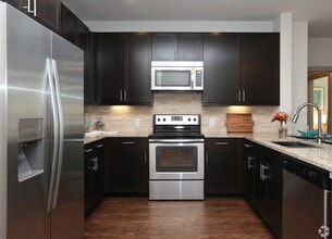 Building Photo - One Month Free + Prime Location!