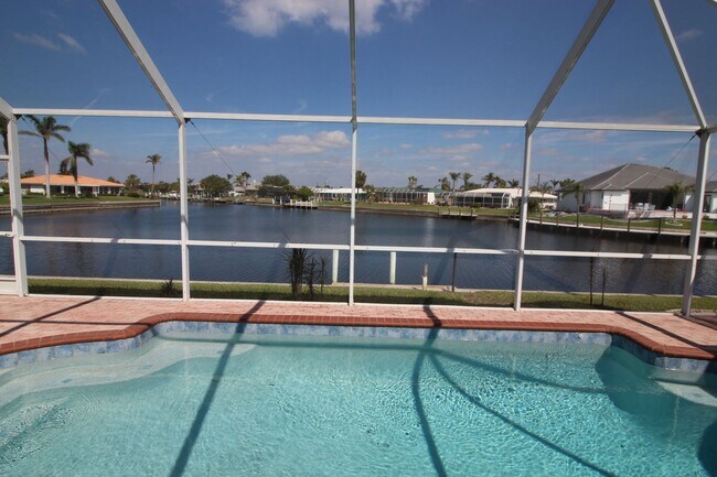 Building Photo - Short Term Rental ** Available 11/1/25 ** 3 Bed/2 Bath Pool Home ** Punta Gorda Isles** $7,500/mo