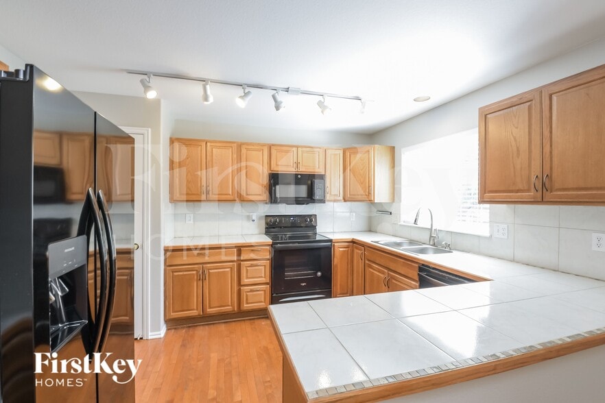 Building Photo - 2839 E 118th Cir