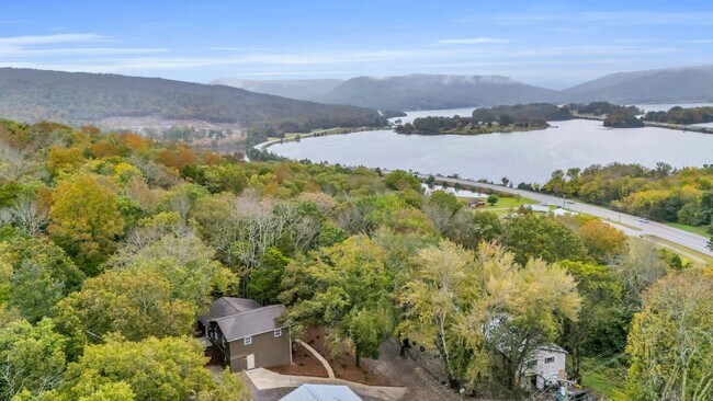 Building Photo - Retreat Like Feel + Practically New! 4 Beds, 3 Baths, Over 2,000 Sq Ft. with Glimpses of Nickajac...