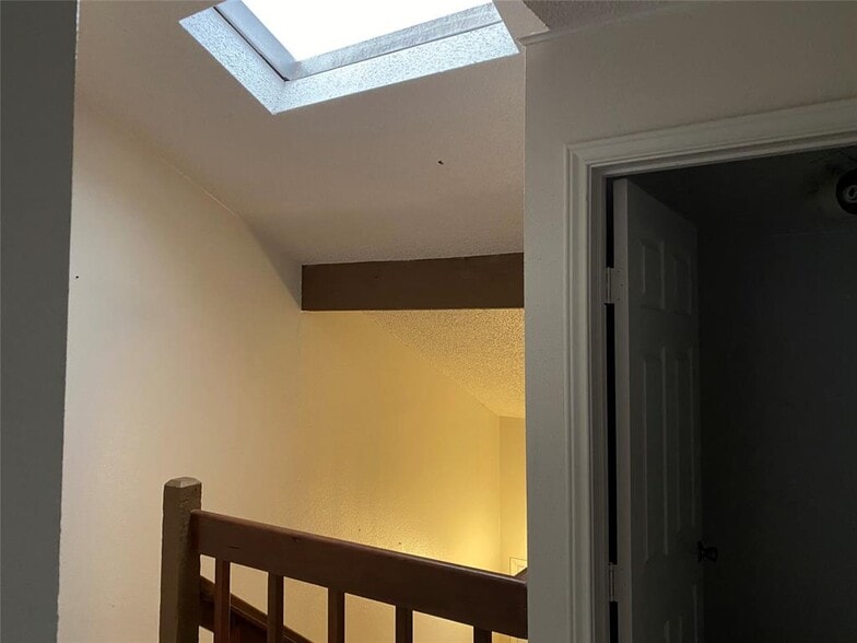 Bright skylight gives peaceful sunshine to the living room - 3232 Windchase Blvd