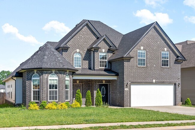 Building Photo - Pet Friendly Four Bedroom with Bonus!