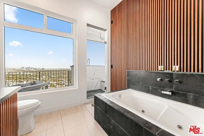 Building Photo - 8425 Hillside Ave