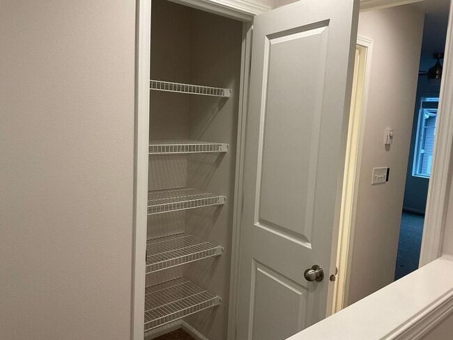 Building Photo - Riverfront Townhome with Tandem Garage & Fenced Yard