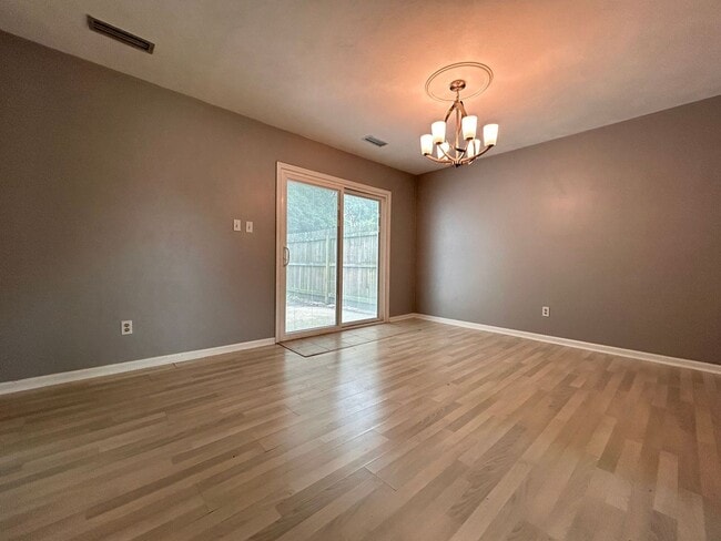 Building Photo - Welcome to this charming 3 bedroom "ASK AB...