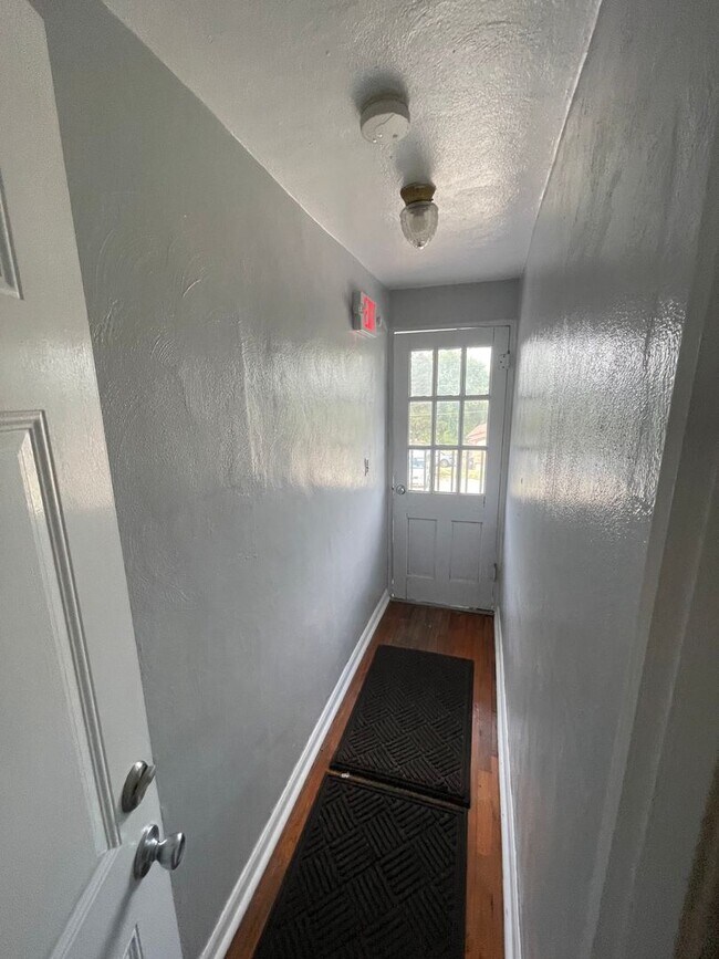 Building Photo - Large 1 Br upstairs apartment - with 2 bon...