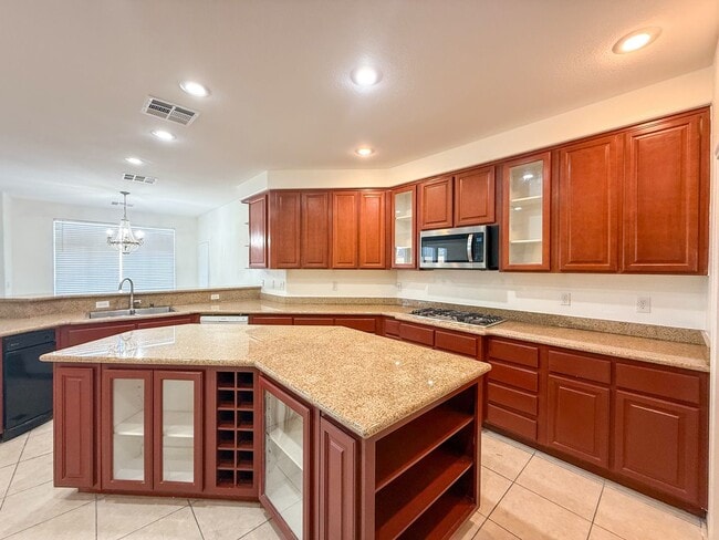 Building Photo - SPACIOUS HOME IN GATED COMMUNITY WITH POOL, RV PARKING & 4-CAR GARAGE!