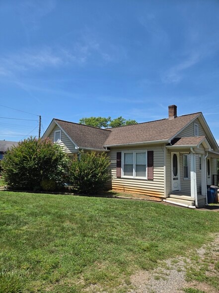 B4 bushes trimmed. Side porch. - 406 Park Ave