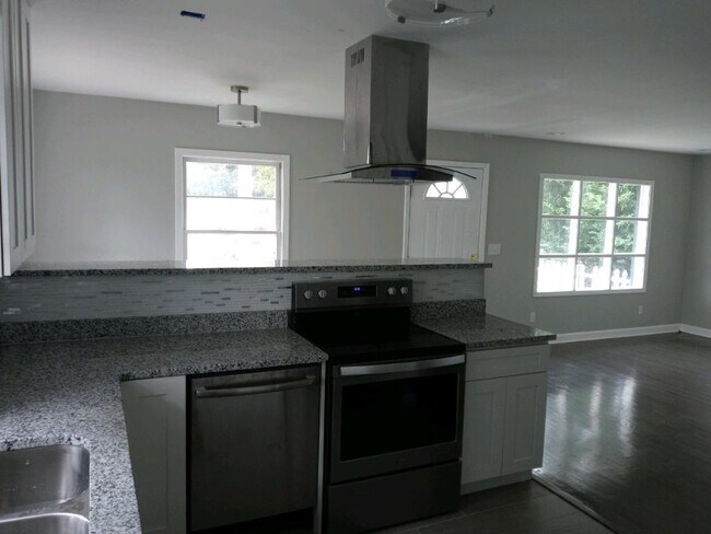 Kitchen looking into Living Room - 1004 Bate Ave