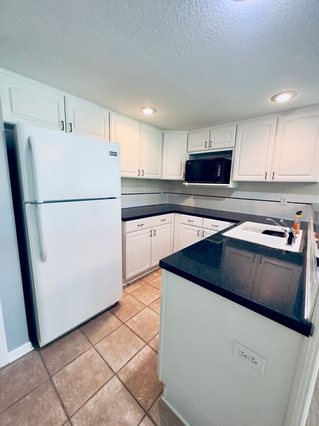 Building Photo - {6411} Enchanted Lake Estates + Updated Kitchen, Fresh Paint Throughout +  Main Floor Primary Bed...