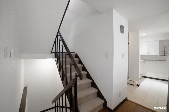 Building Photo - Spacious 4BR Condo in Evergreen