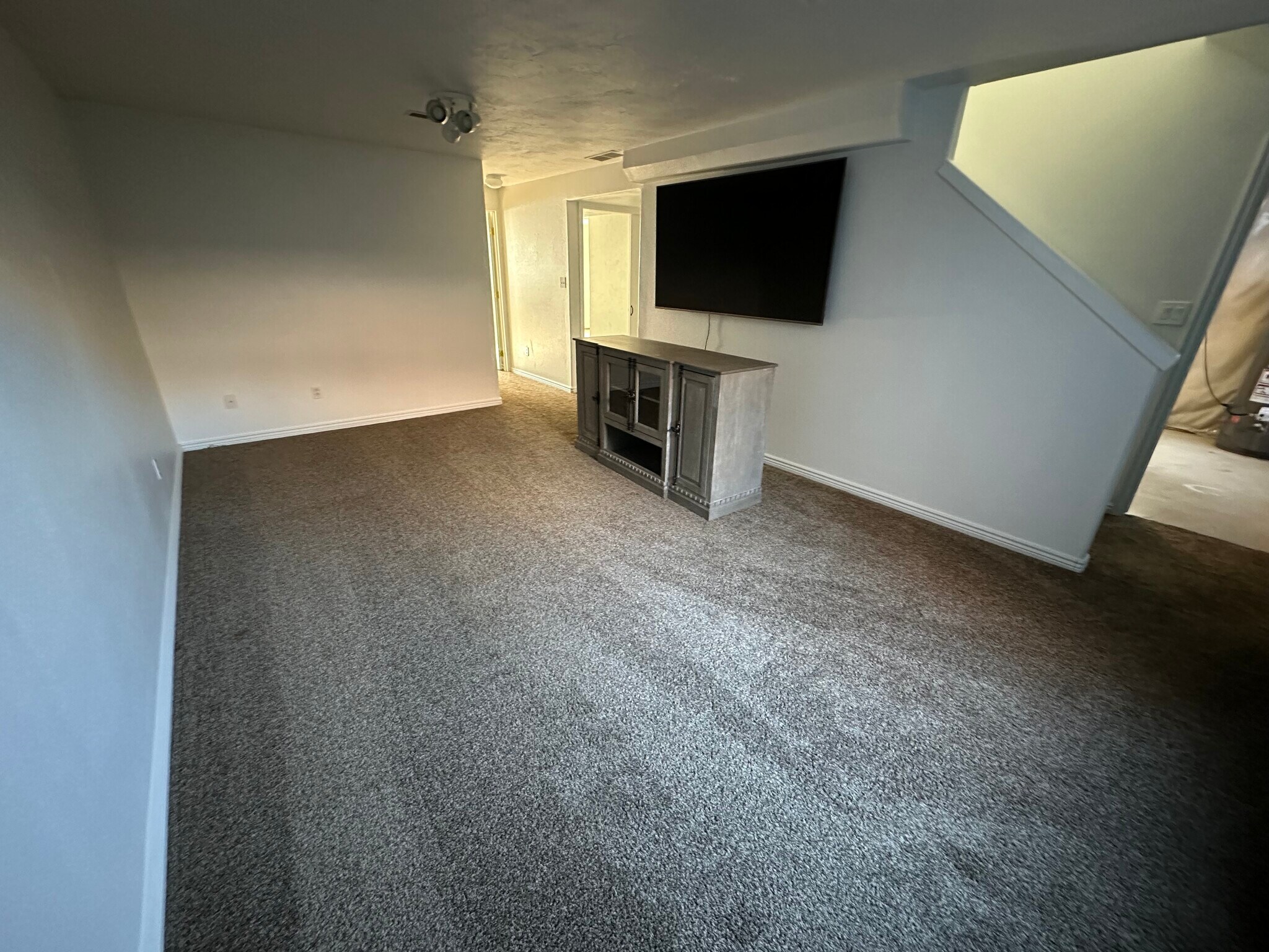 Downstairs family room inc TV & entertainment center - 3081 Jackie Ct