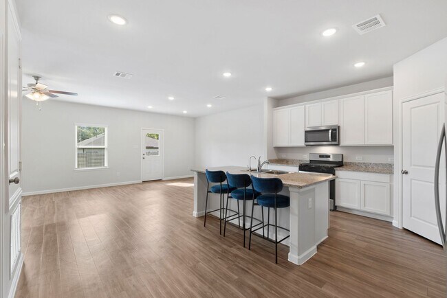 Building Photo - Stylish Home with Gym & Upgrades - Minutes...