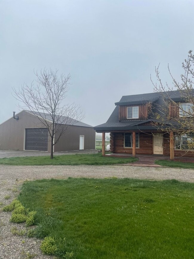 Building Photo - Charming Log Home For Rent with Large Shop & Spacious Yard