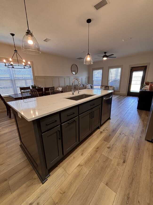 Building Photo - Need Space?  How about 5 bedrooms, 2.5 baths + an extra bonus area upstairs so that the kids can ...