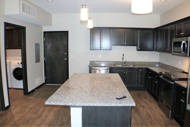 Building Photo - $1,285 | 1 Bedroom, 1 Bathroom Condo | ADA Compliant | No Pets | Available for Immediate Move In!