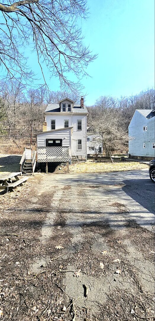 Building Photo - Spacious 4-Bedroom Home with 3-Car Garage, Deck & More!!