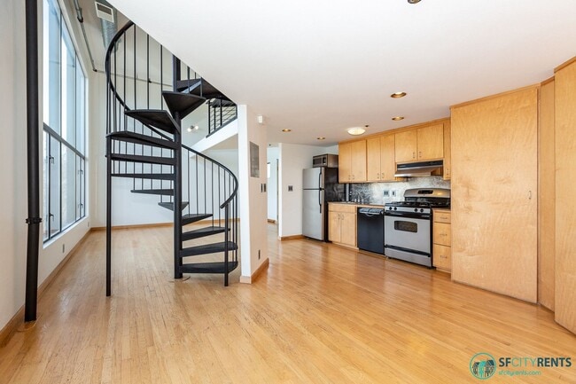Building Photo - Mission District: Top Floor Loft w/ Roof Deck, Parking & W/D in unit