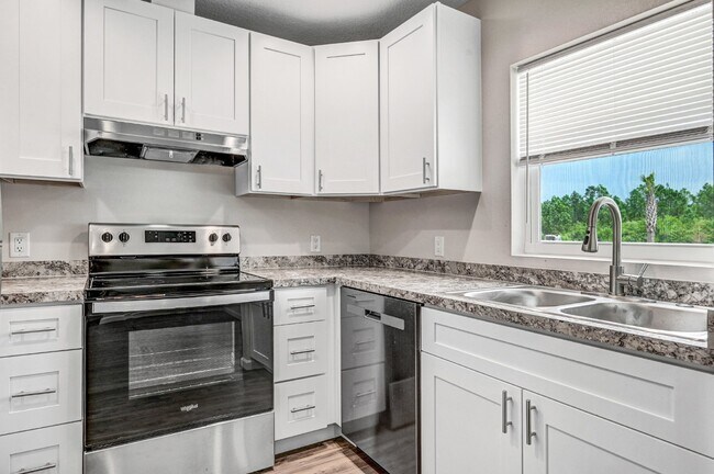 Building Photo - NEW YEAR MOVE IN SPECIAL! Charming 2 bedroom blending style and functionality