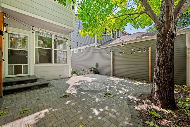 Building Photo - Stunning Tennyson Park Home | 4 Bedrooms, Finished Basement & Open Space Views