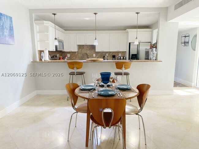 Building Photo - 19370 Collins Ave