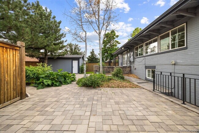 Building Photo - "Spacious 5-Bedroom Gem with Hardwood Floors & Cozy Fireplace in Denver's Heart!"